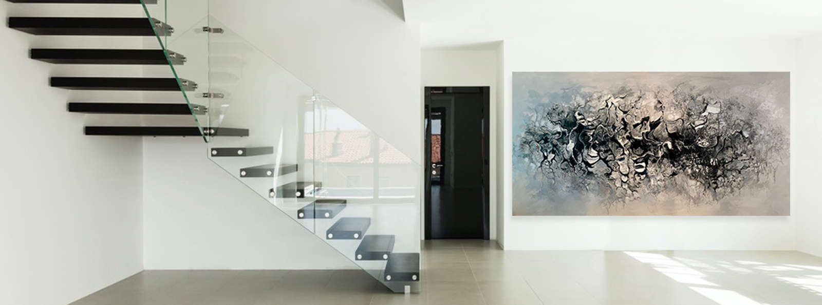 Large modern home with a futuristic feeling abstract painting. 